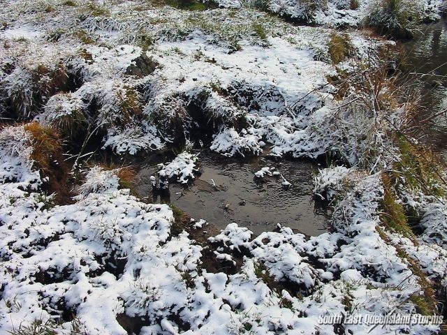 Small stream with snow