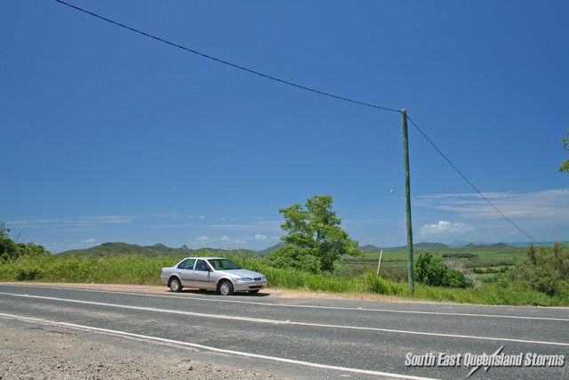 My car overlooking the cane fields