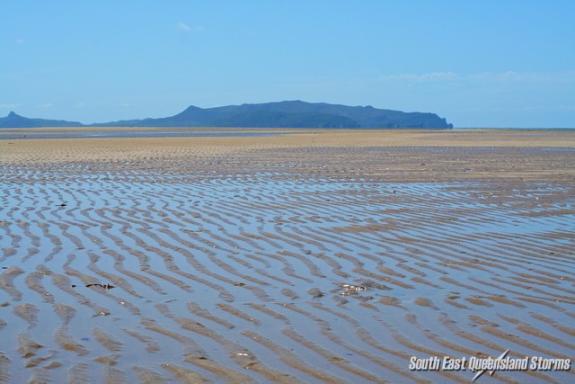 Low tide exposes rippled sand patterns at Shoal Point