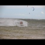 Kite Surfer at Bullcock beach making a sharp turn, Caloundra
