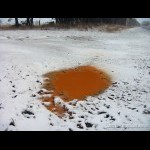 Frozen mud puddle