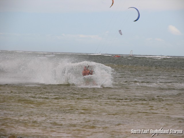 Kite Surfer at Bullcock beach making a sharp turn, Caloundra